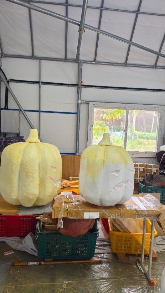 Two oversized foam pumpkins in progress