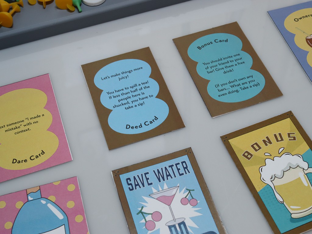 Last Call deed, dare, and bonus cards spread on a table