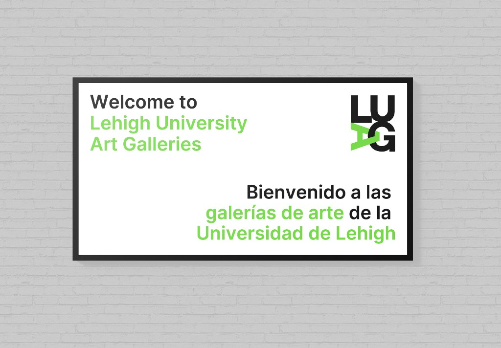 Bilingual LUAG welcome sign in English and Spanish with LUAG logo
