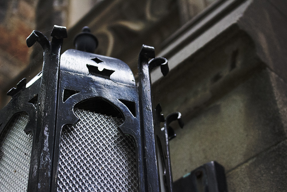 Close-up of an ornate black iron lantern
