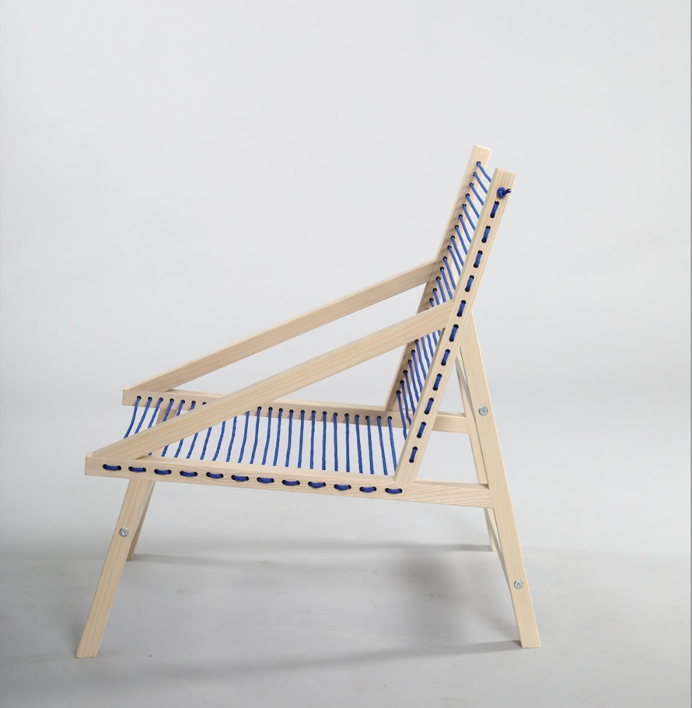 Tricoard Chair in profile — light wood frame with blue cord seat and backrest